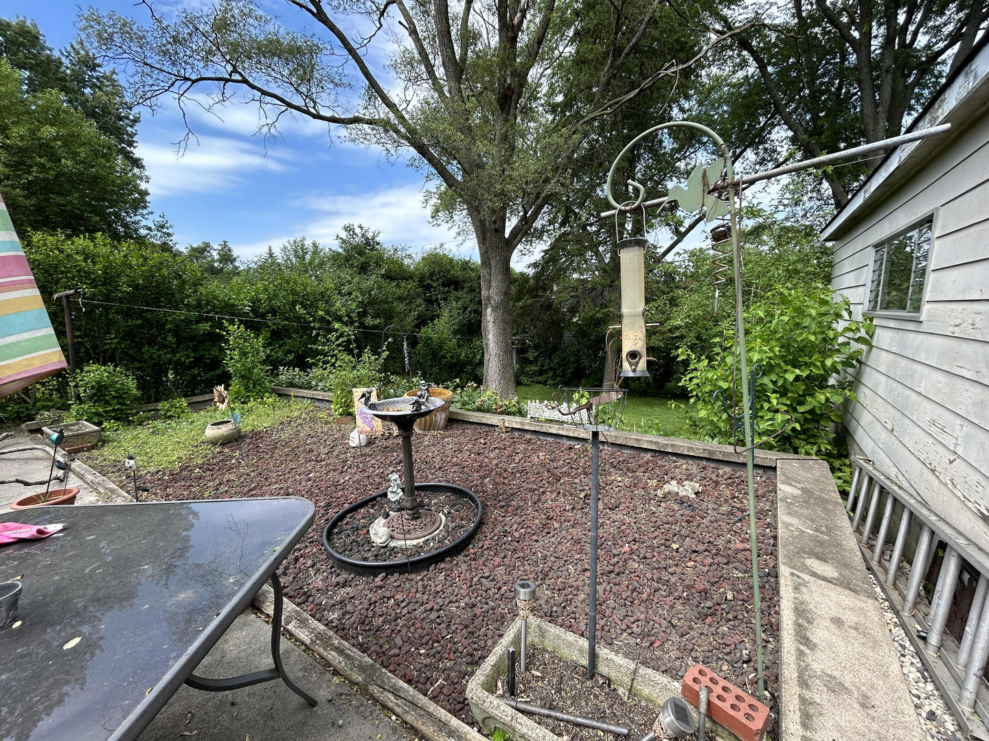 328 Raupp Boulevard Buffalo Grove, IL 60089 - Photo 19 of 22 a view of a backyard with sitting area