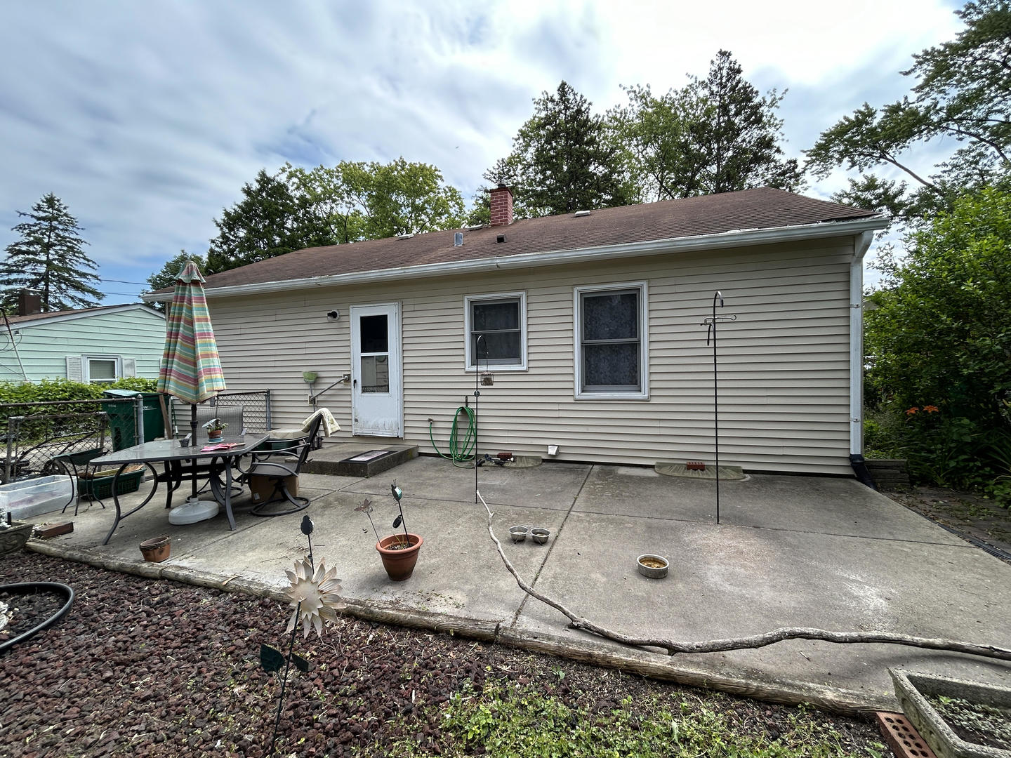 328 Raupp Boulevard Buffalo Grove, IL 60089 - Photo 21 of 22 a view of backyard with outdoor seating and green space
