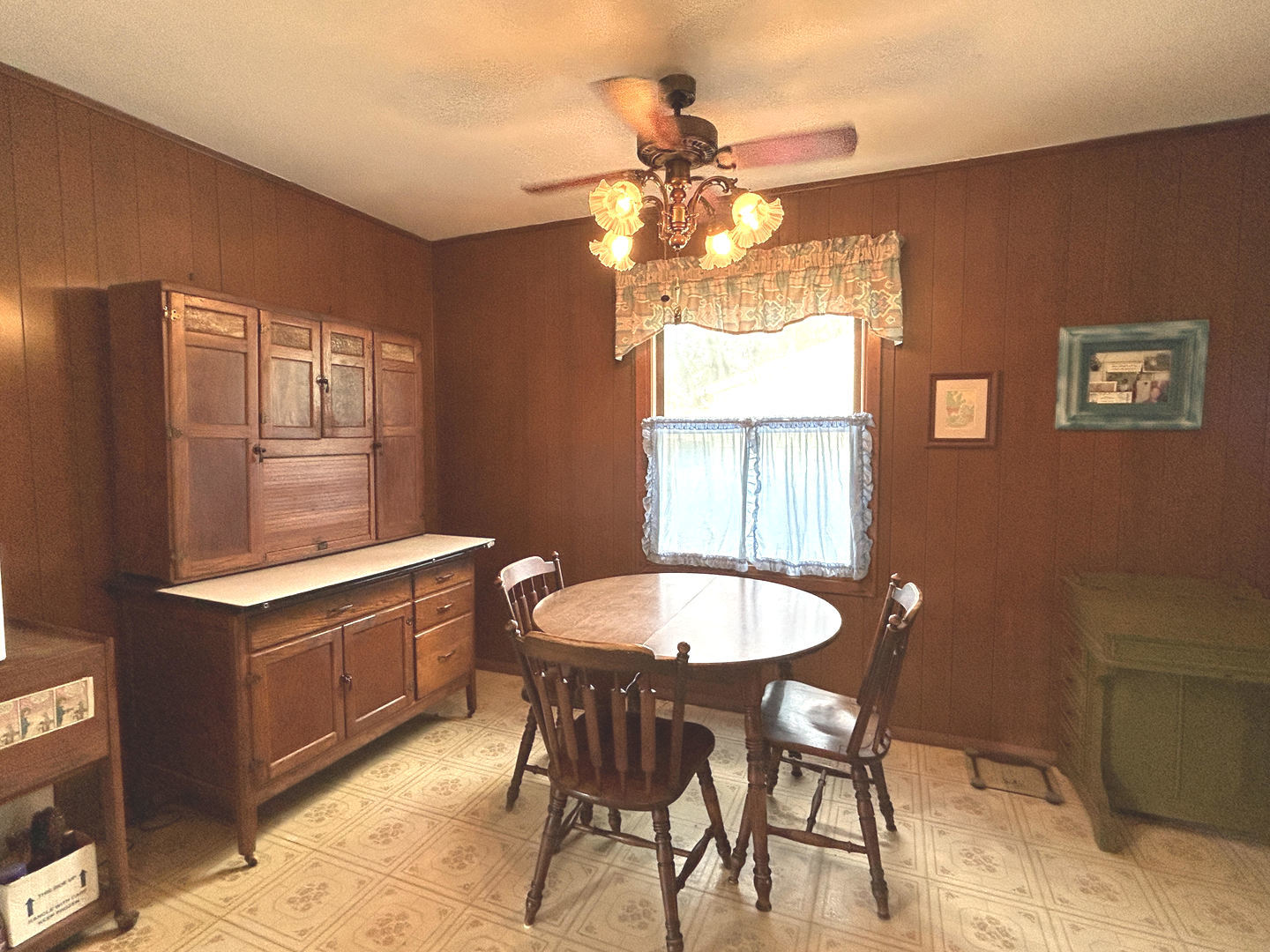 328 Raupp Boulevard Buffalo Grove, IL 60089 - Photo 6 of 22 a dining room with a wooden table and chairs