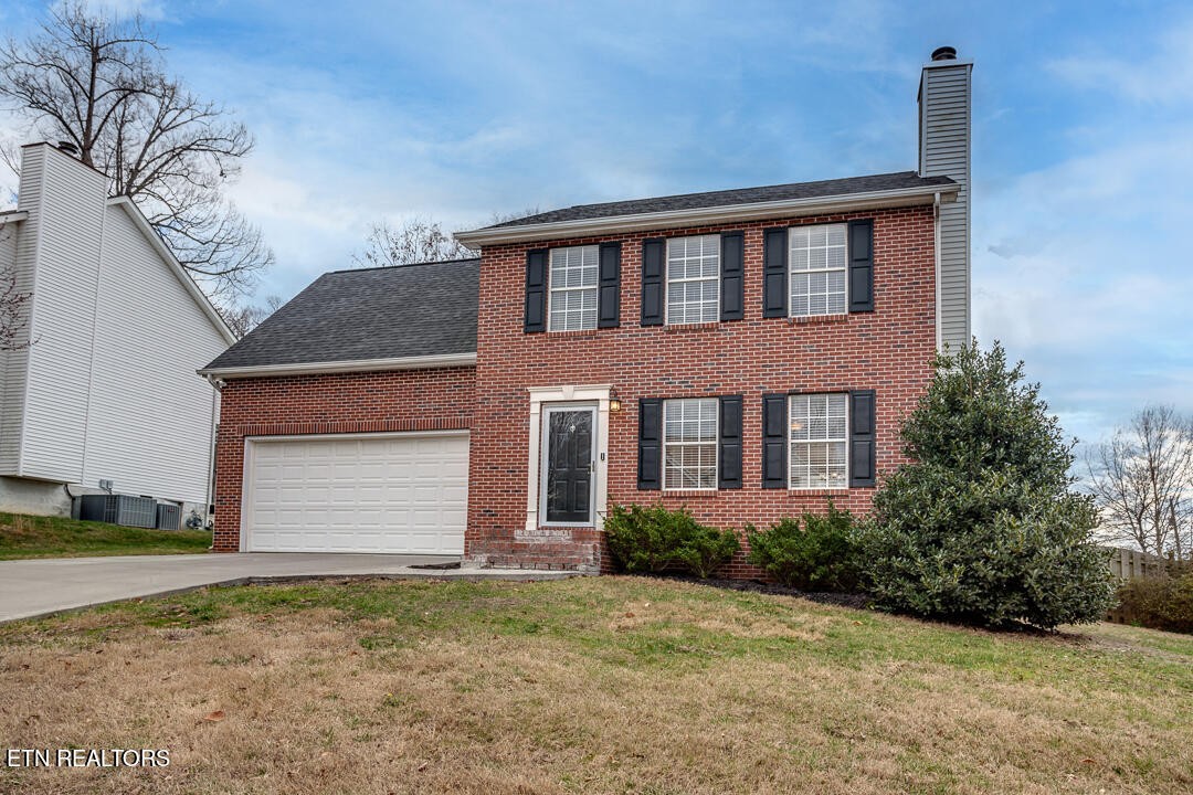1296 Emerald Forest Lane Powell, TN 37849 - Photo 2 of 43 a front view of house with yard