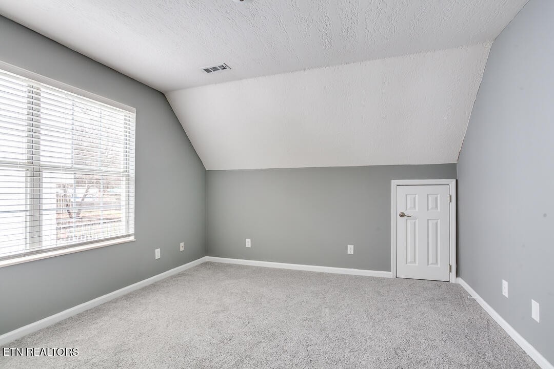 1296 Emerald Forest Lane Powell, TN 37849 - Photo 31 of 43 a view of an empty room with a window