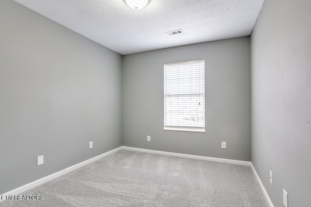 1296 Emerald Forest Lane Powell, TN 37849 - Photo 36 of 43 an empty room with a window