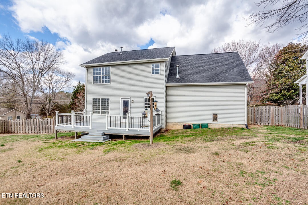 1296 Emerald Forest Lane Powell, TN 37849 - Photo 42 of 43 a view of a house with a yard and a large tree