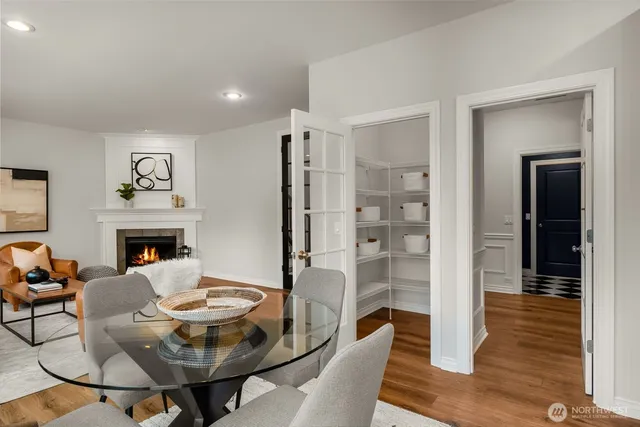 a view of a livingroom with furniture and a fireplace