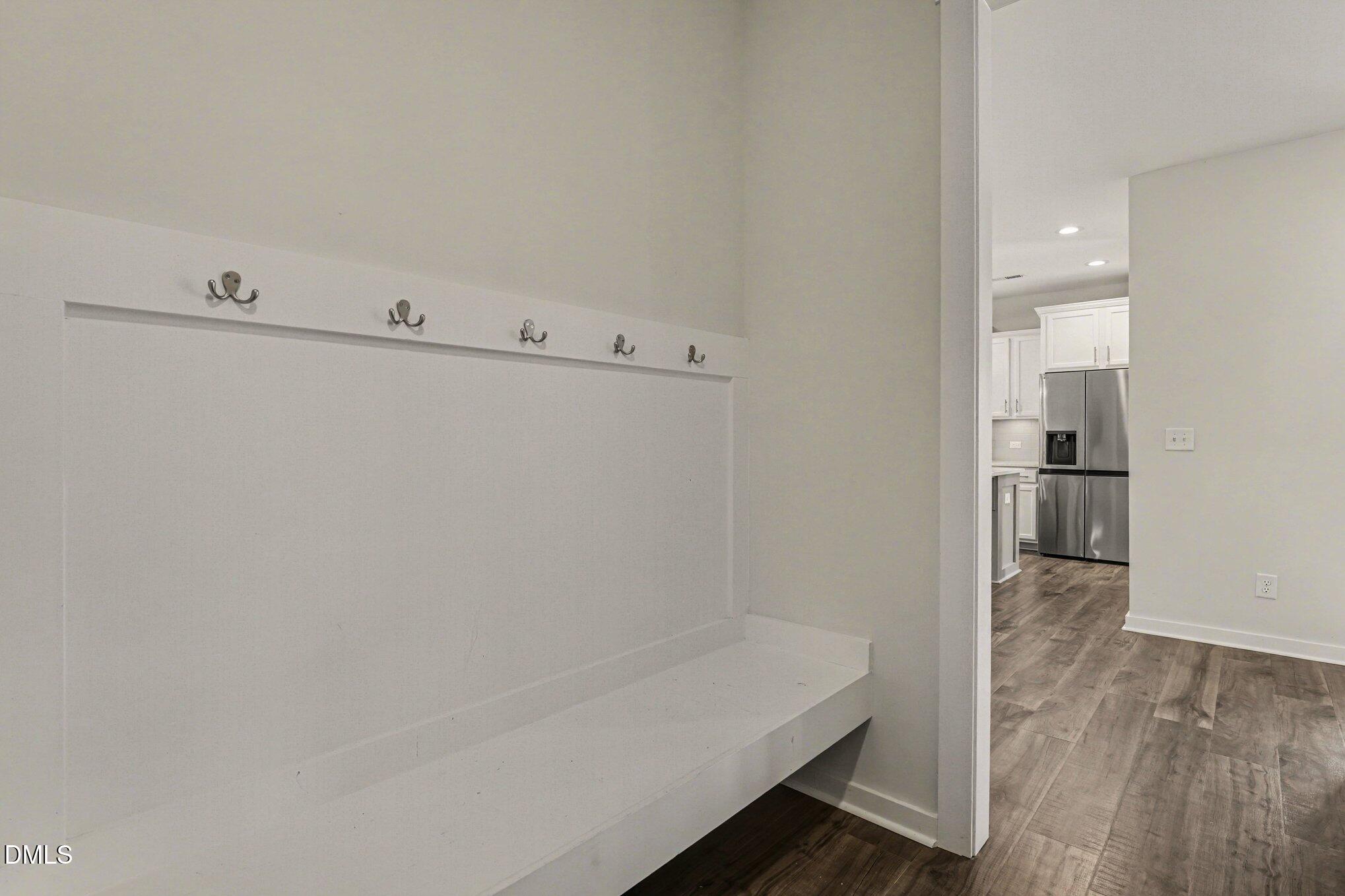 51 East Dentaires Way Willow Spring, NC 27592 - Photo 19 of 39 a view of hallway with wooden floor