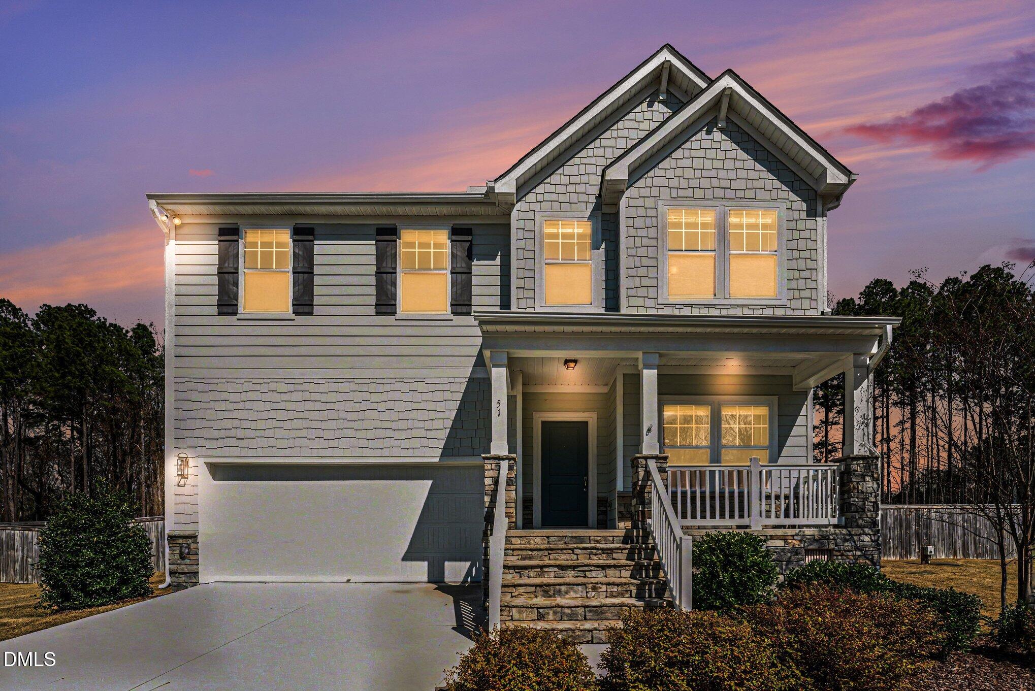 51 East Dentaires Way Willow Spring, NC 27592 - Photo 2 of 39 a front view of a house