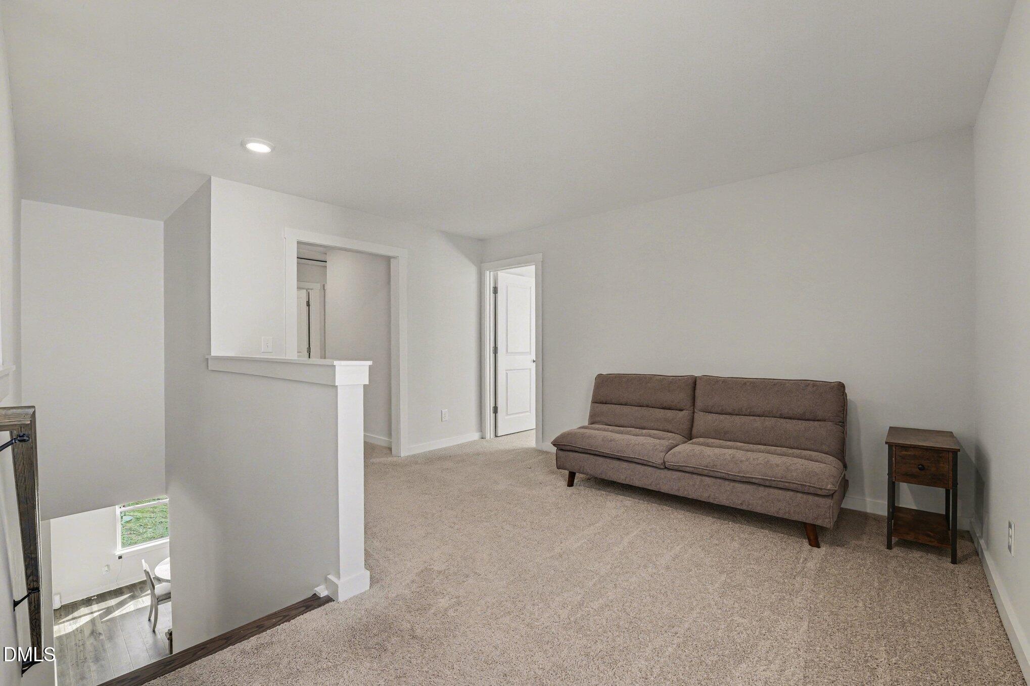 51 East Dentaires Way Willow Spring, NC 27592 - Photo 23 of 39 a living room with furniture and a ceiling fan