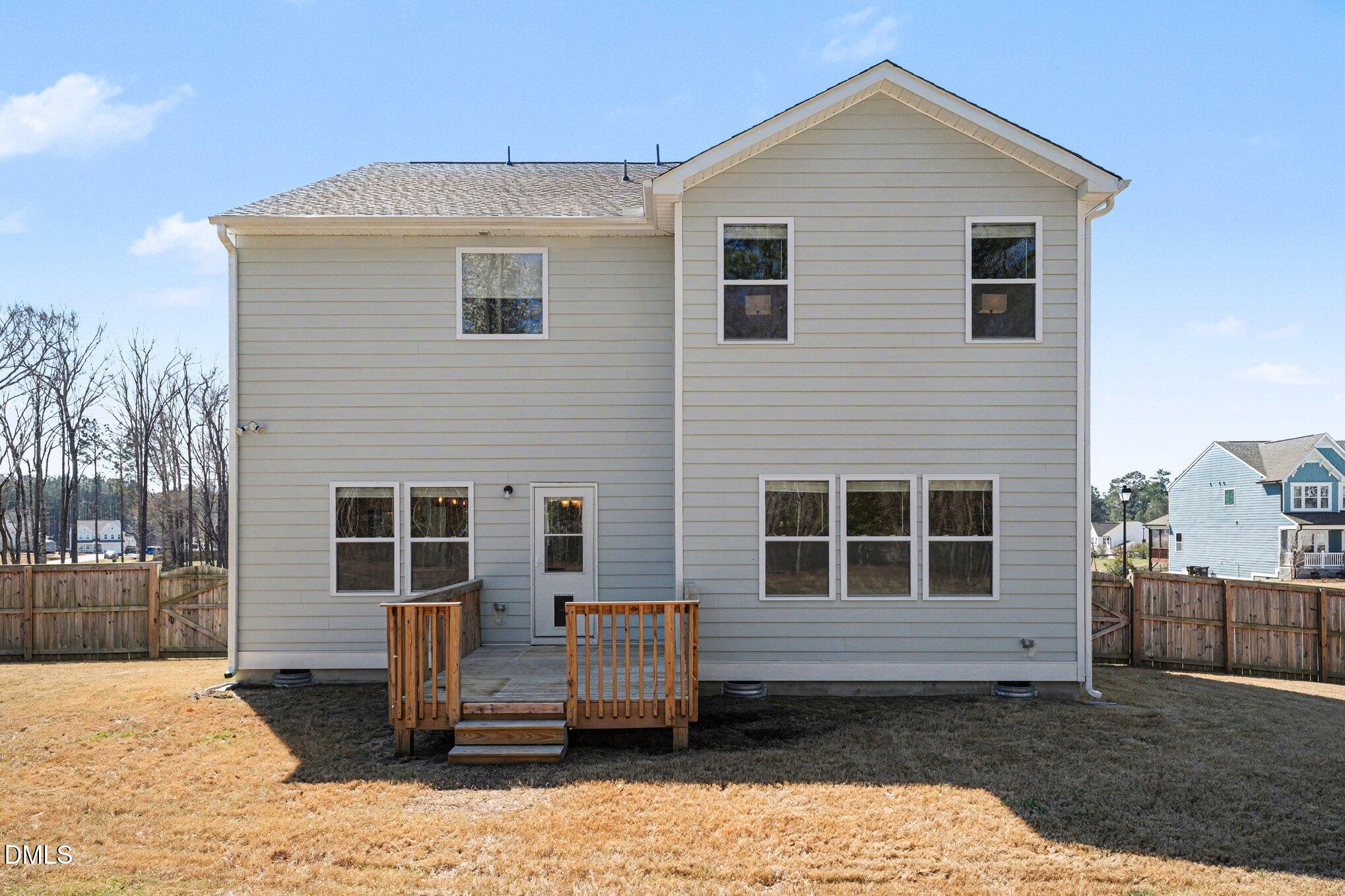 51 East Dentaires Way Willow Spring, NC 27592 - Photo 35 of 39 a view of a house with a yard