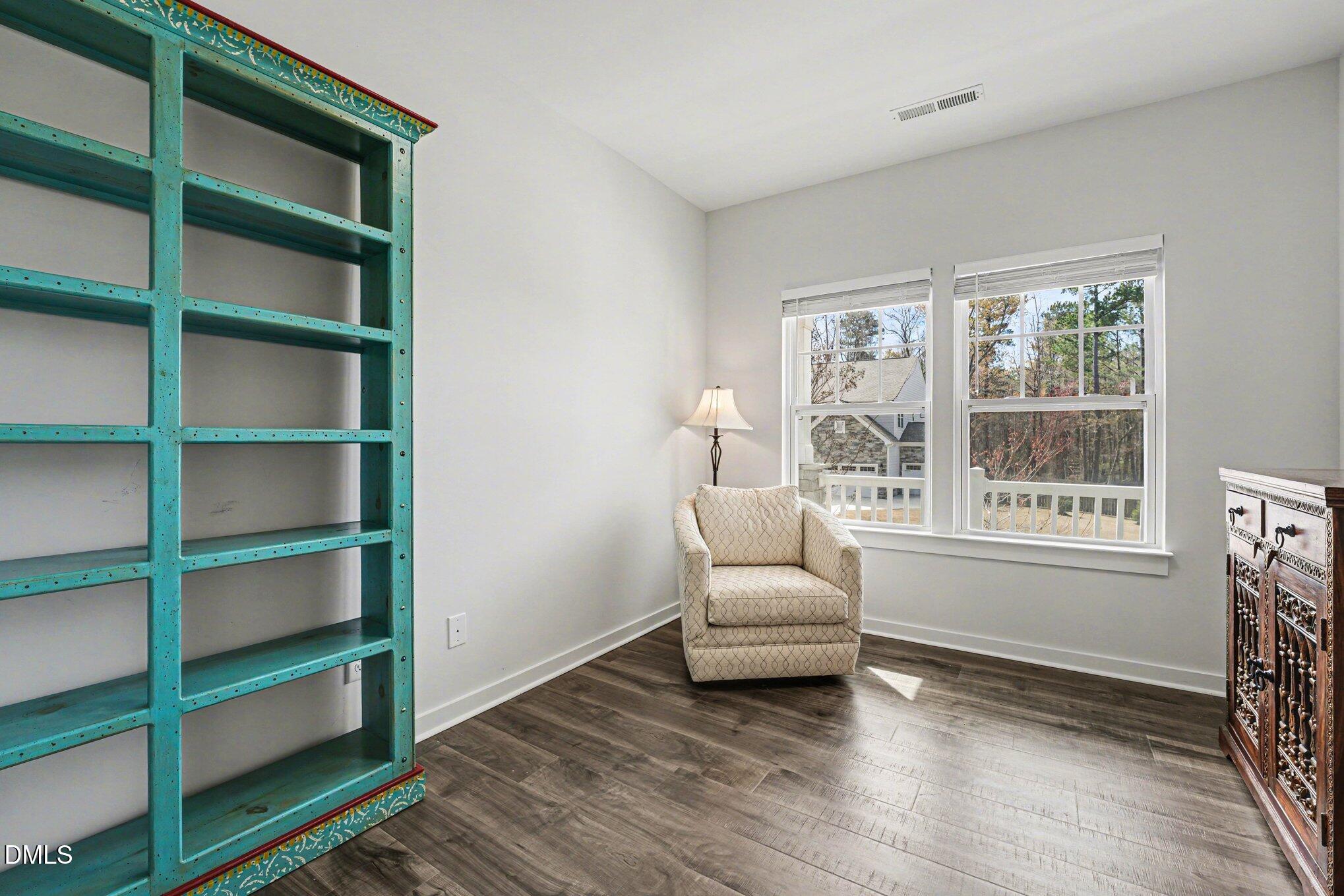 51 East Dentaires Way Willow Spring, NC 27592 - Photo 6 of 39 a living room with furniture and a window