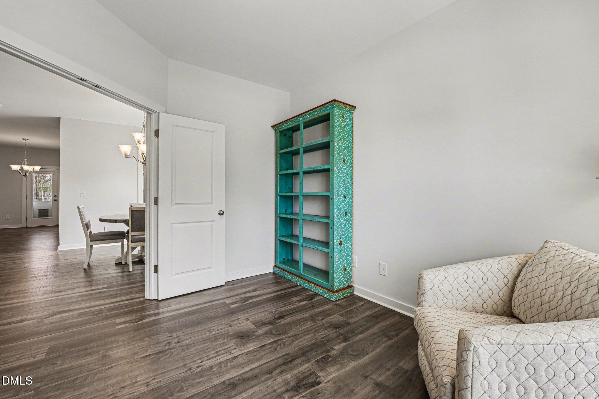 51 East Dentaires Way Willow Spring, NC 27592 - Photo 7 of 39 a bedroom with a bed and a couch
