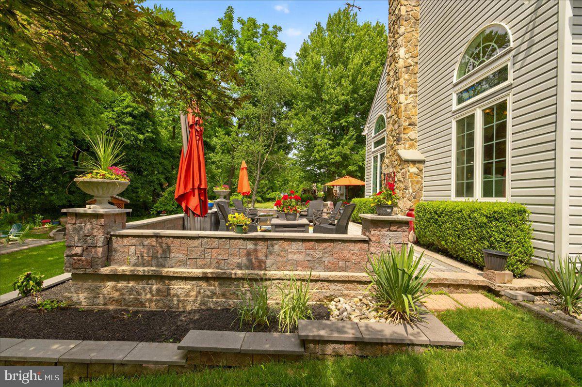234 Tether Way Doylestown, PA 18901 - Photo 40 of 44 Stone wall seating area