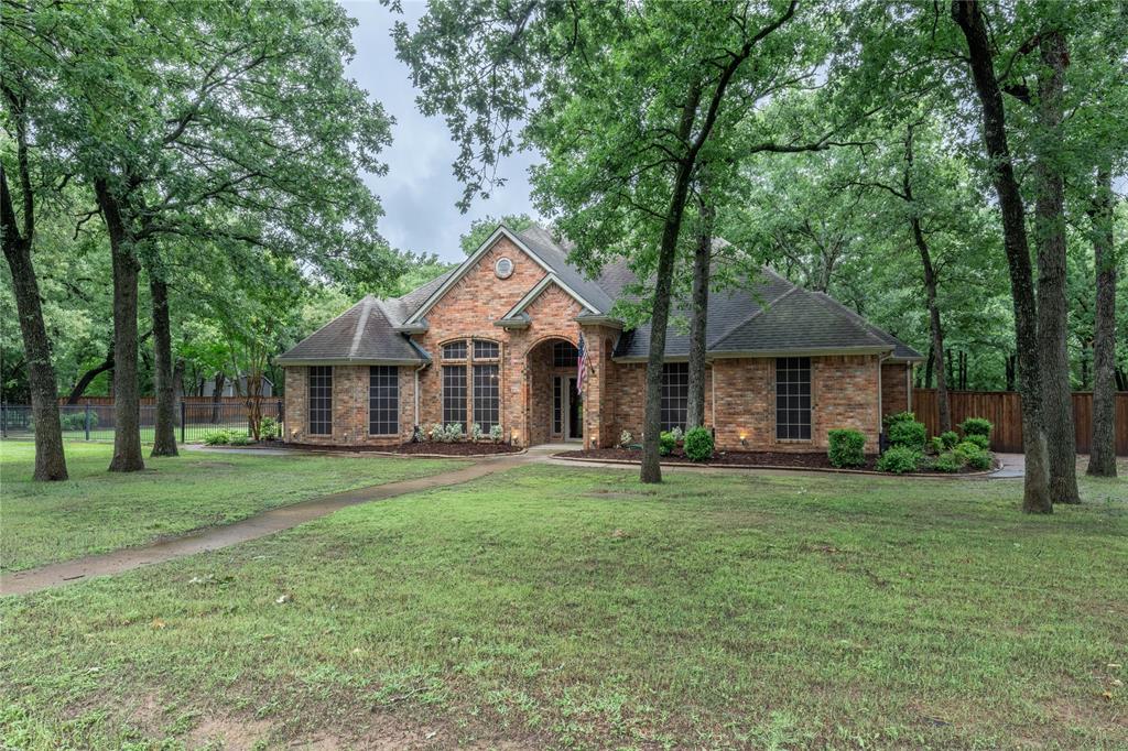 320 Rustic Oaks Road Combine, TX 75159 - Photo 1 of 40 View of front of property featuring brick siding and roof with shingles