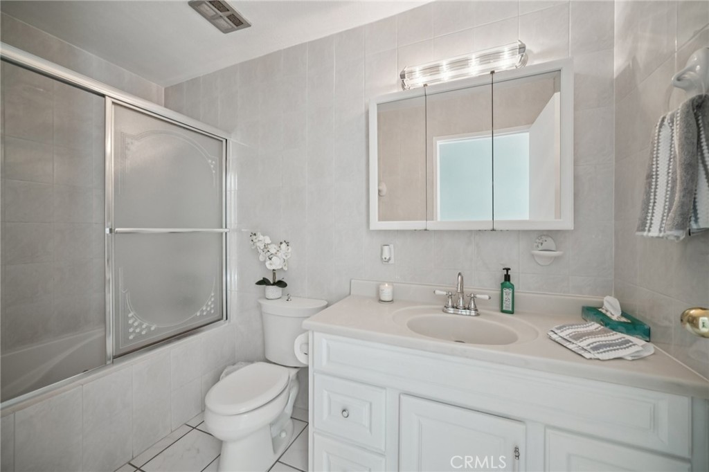 11461 Amigo Avenue Porter Ranch, CA 91326 - Photo 25 of 52 a bathroom with a sink toilet and shower