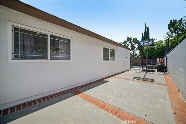 a front view of a house with swimming pool