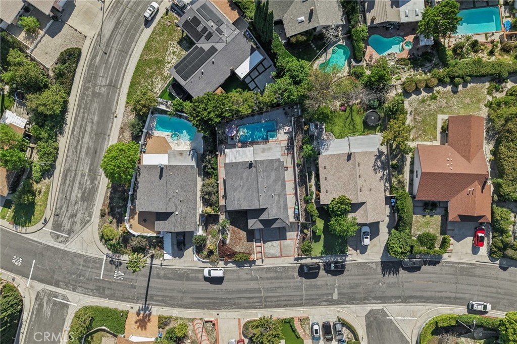 11461 Amigo Avenue Porter Ranch, CA 91326 - Photo 41 of 52 an aerial view of a house with garden space and street view