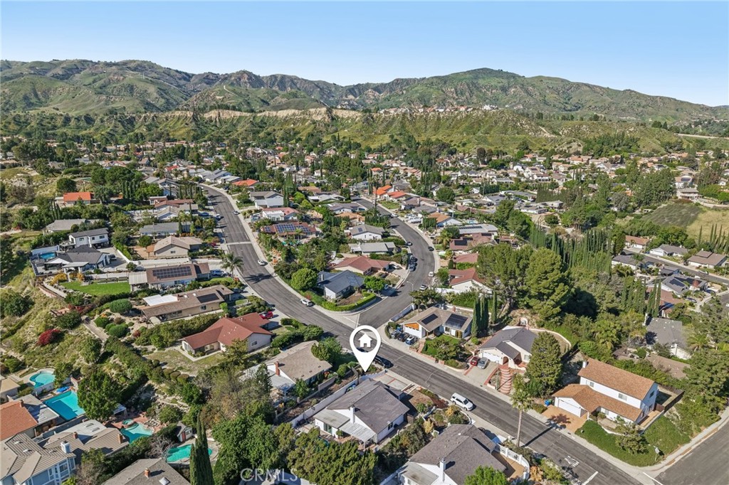 11461 Amigo Avenue Porter Ranch, CA 91326 - Photo 45 of 52 an aerial view of residential houses with outdoor space and trees