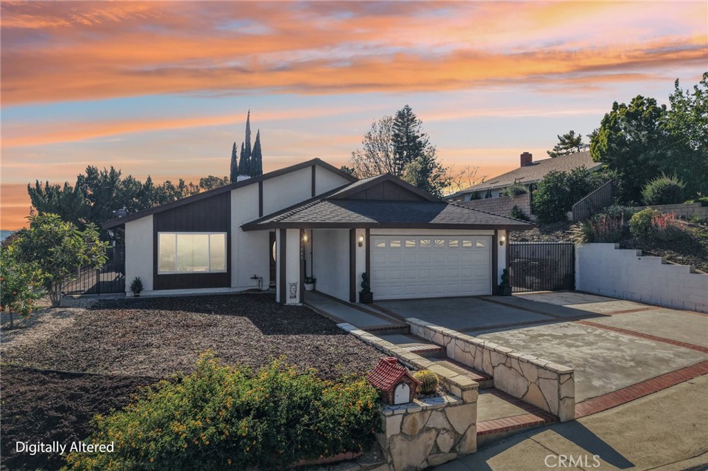 11461 Amigo Avenue Porter Ranch, CA 91326 - Photo 52 of 52 a front view of a house with a yard