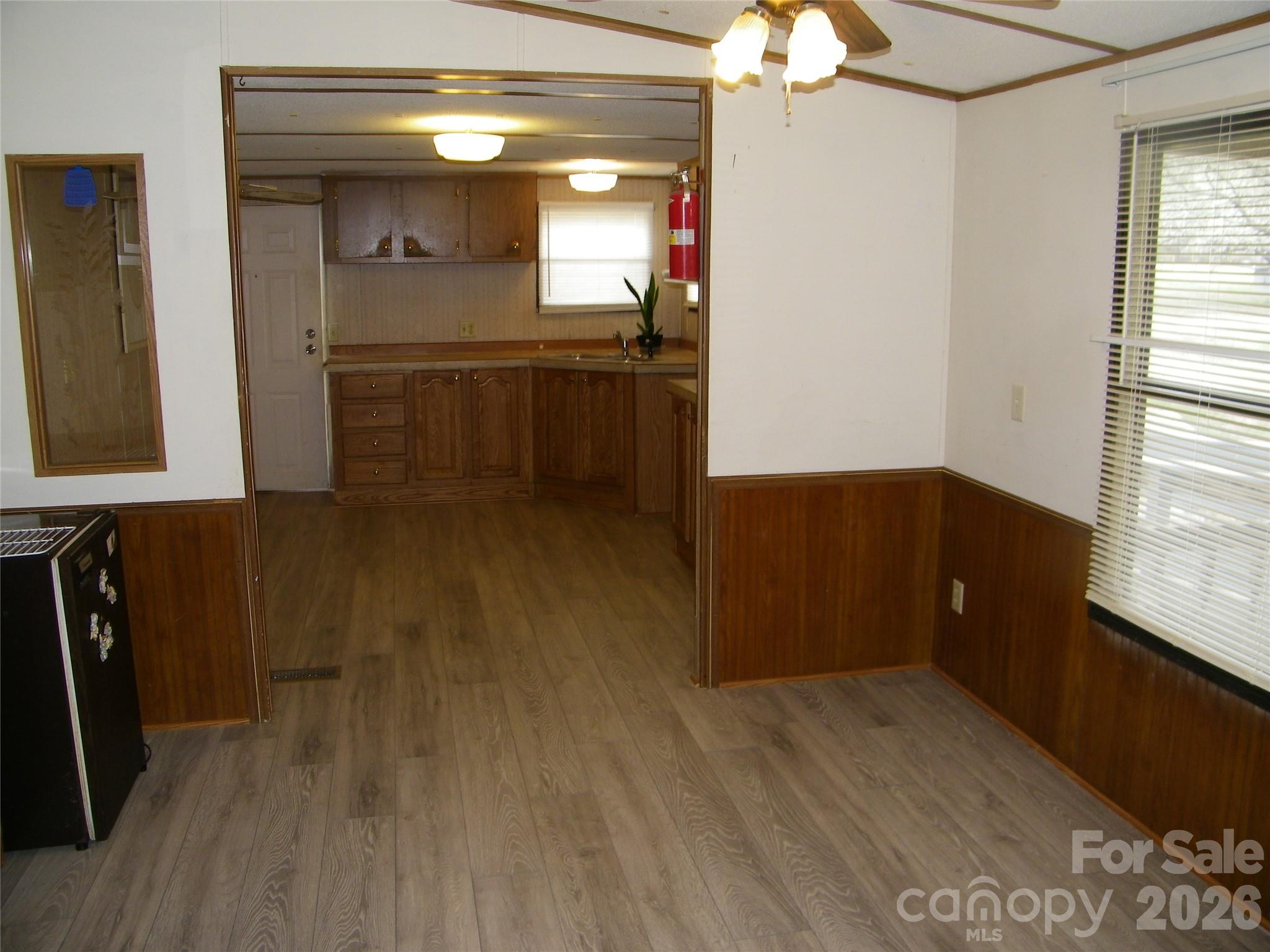 355 Ranchwood Drive Salisbury, NC 28146 - Photo 13 of 18 wooden floor in an empty room with a window
