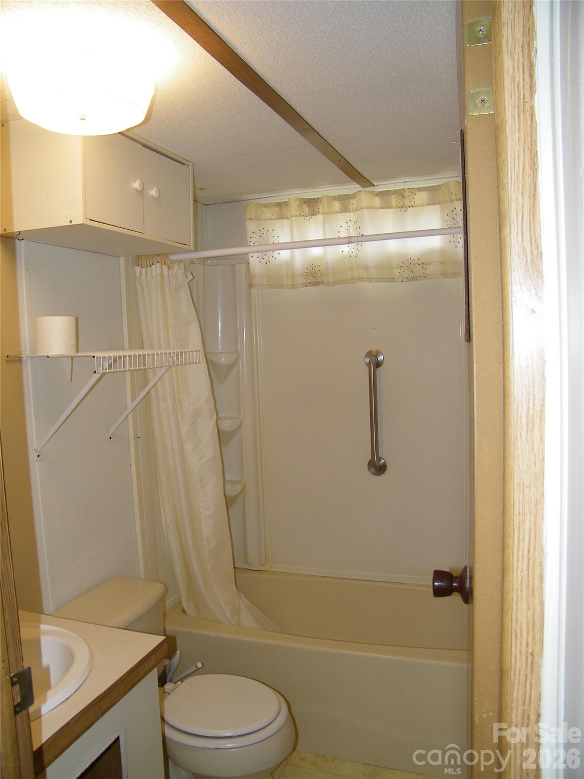 355 Ranchwood Drive Salisbury, NC 28146 - Photo 15 of 18 a bathroom with a shower toilet and sink