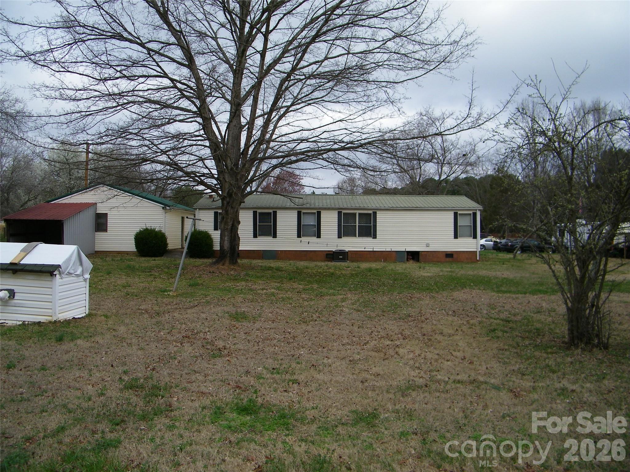 355 Ranchwood Drive Salisbury, NC 28146 - Photo 17 of 18 a view of house with yard