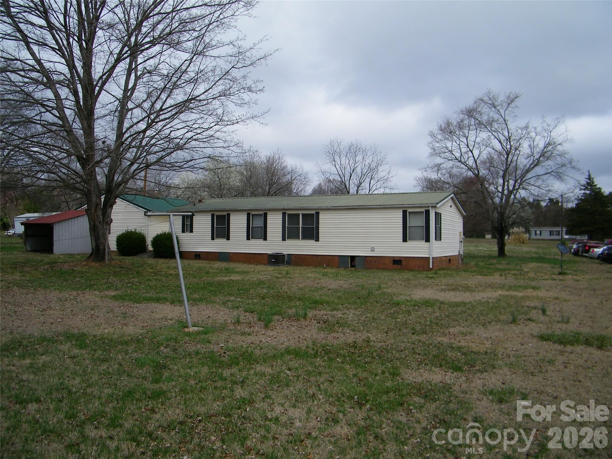 355 Ranchwood Drive Salisbury, NC 28146 - Photo 18 of 18 a view of a house with a backyard