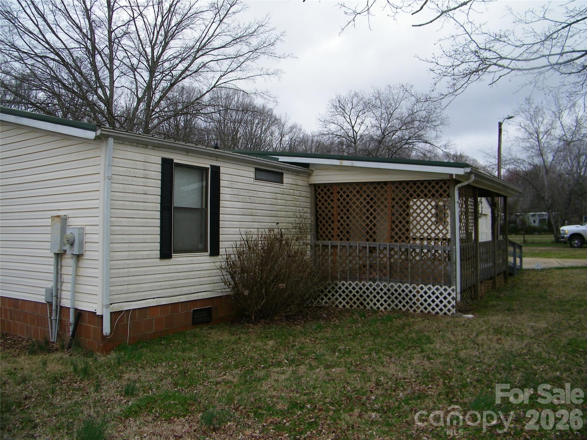 355 Ranchwood Drive Salisbury, NC 28146 - Photo 4 of 18 a front view of a house with garden