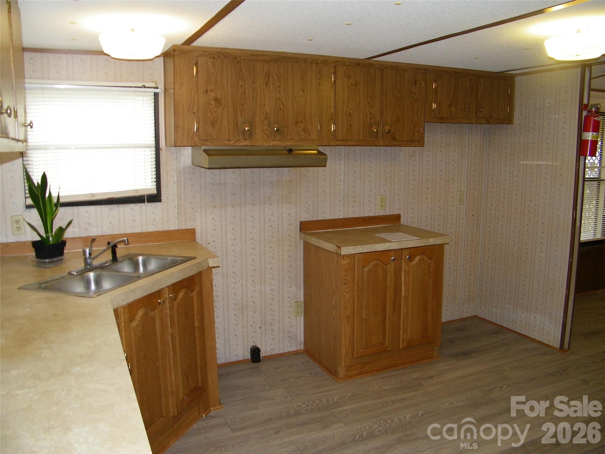 355 Ranchwood Drive Salisbury, NC 28146 - Photo 7 of 18 a utility room with sink dryer and washer