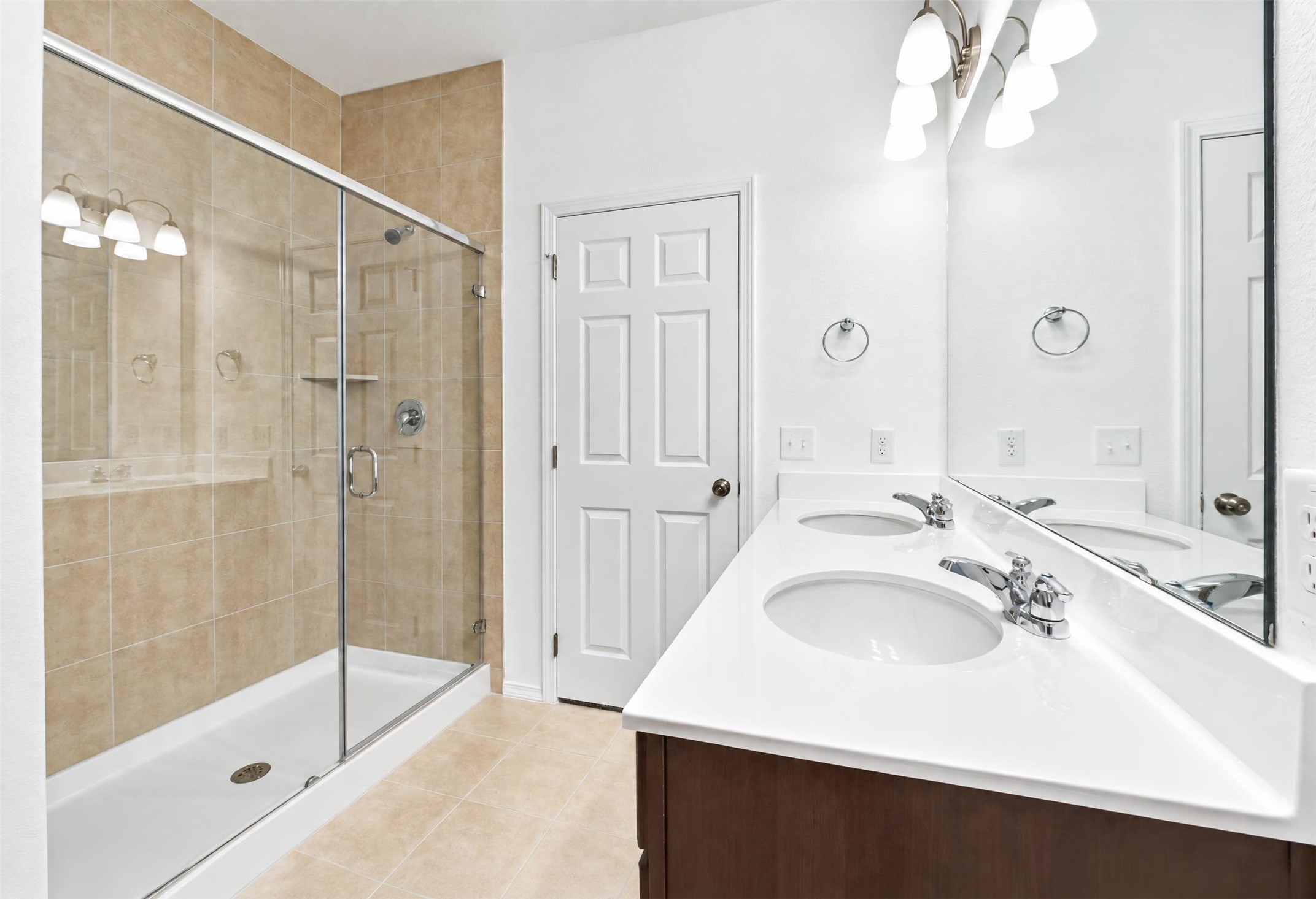 545 Henry Milton Road Georgetown, TX 78626 - Photo 15 of 33 Clean lines and a spacious dual vanity define this modern bathroom.