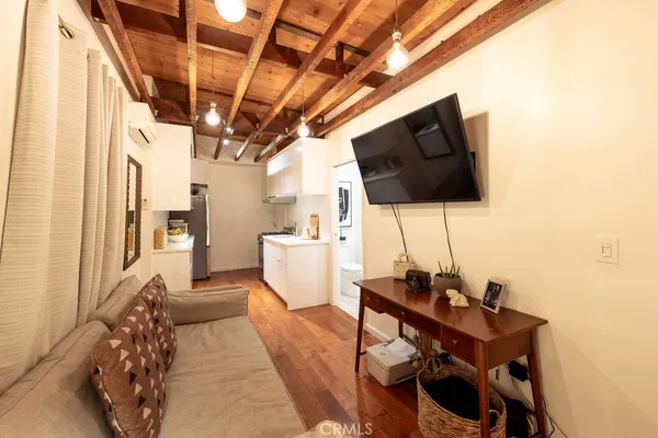 a bed room with a bed and a lamp