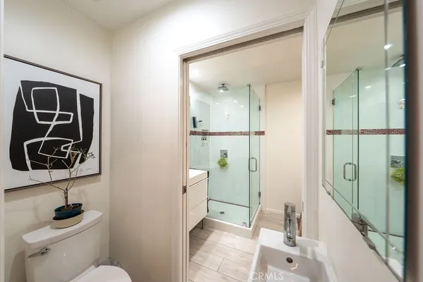 a bedroom with a bed and a closet