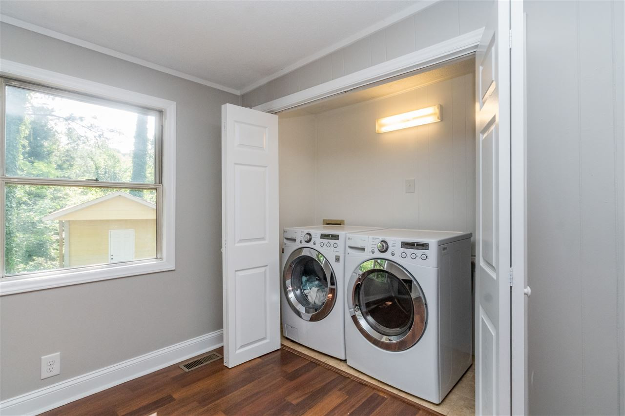 600 North King Charles Road Raleigh, NC 27610 - Photo 15 of 24 Conveniently located and hidden in the family/multipurpose room. Laundry