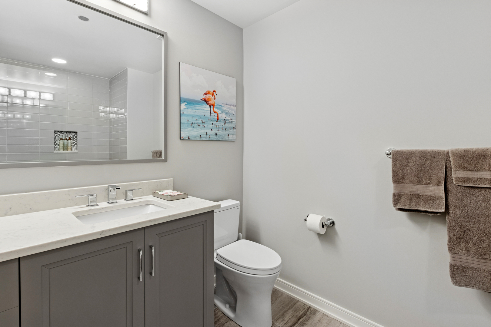 60 East Monroe Street, Unit 3402 Chicago, IL 60603 - Photo 19 of 31 a bathroom with a toilet a sink and mirror