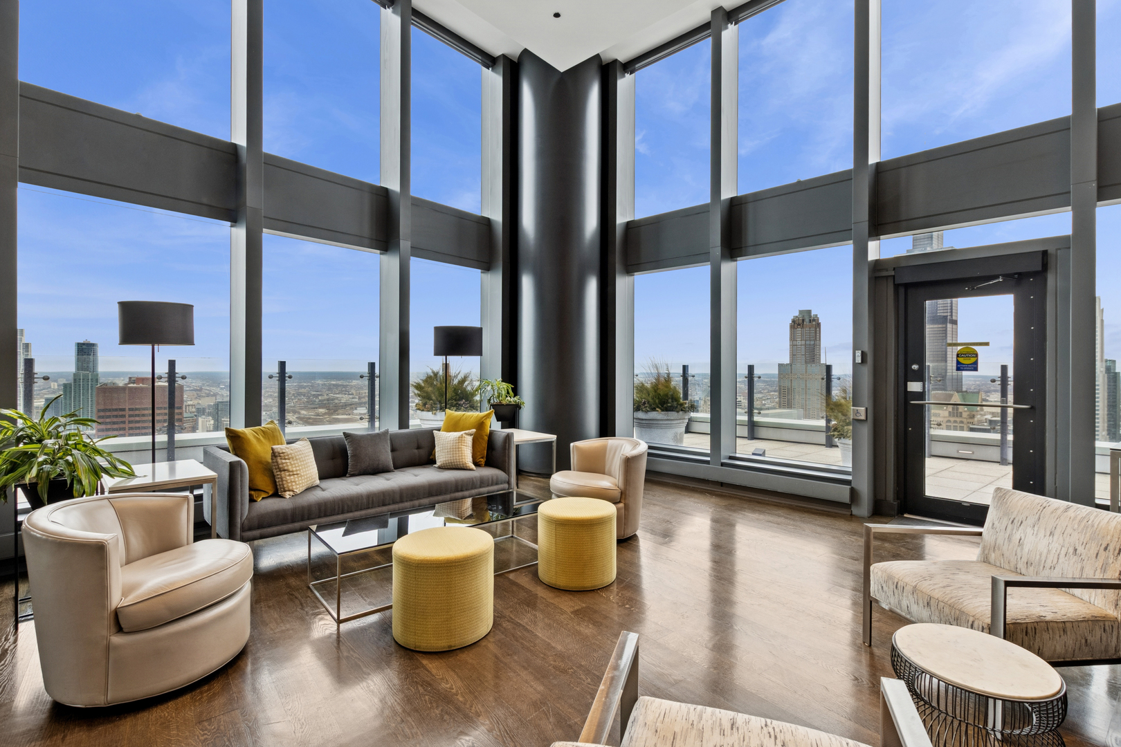 60 East Monroe Street, Unit 3402 Chicago, IL 60603 - Photo 26 of 31 a living room with furniture and a large window