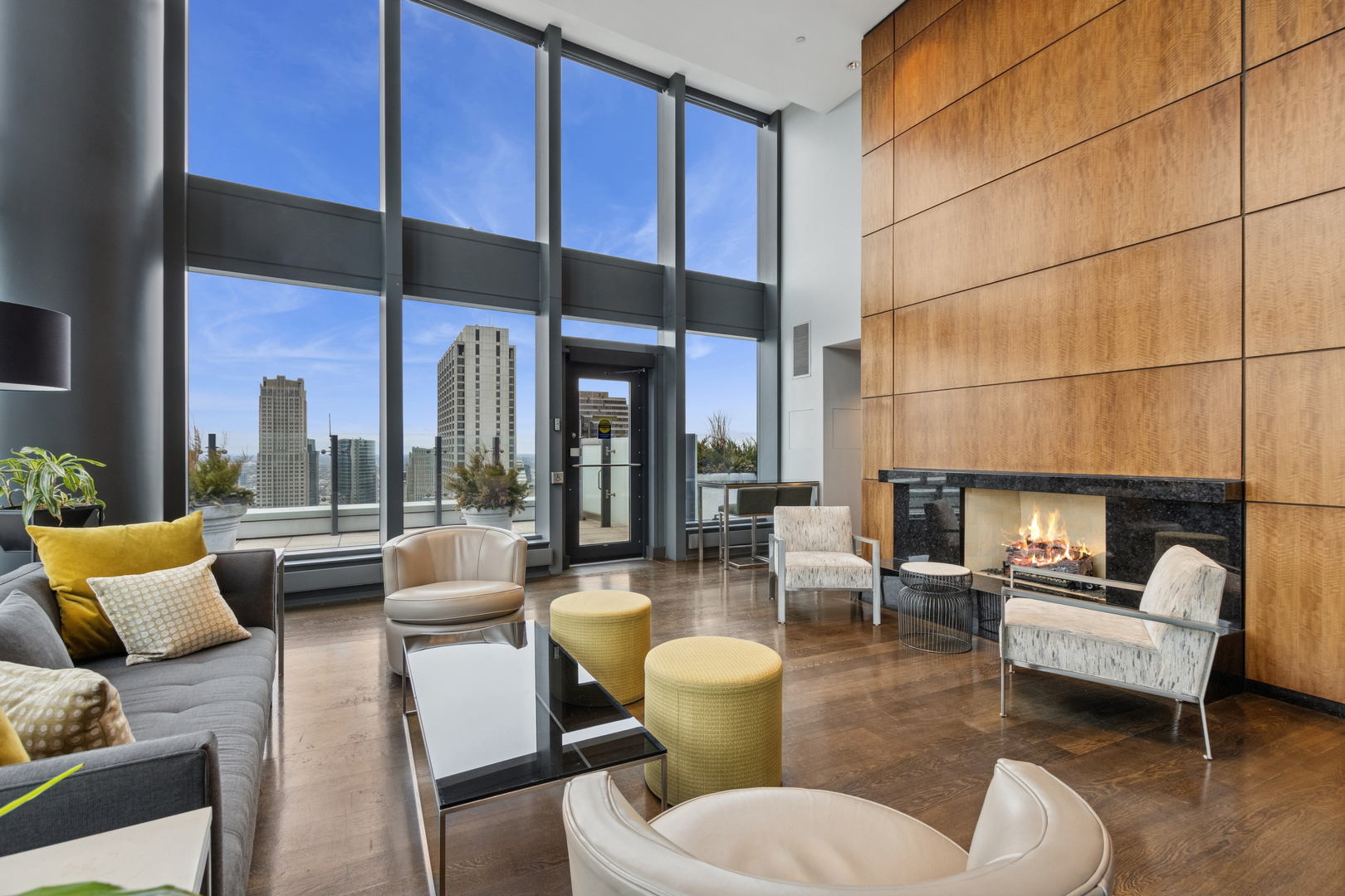 60 East Monroe Street, Unit 3402 Chicago, IL 60603 - Photo 27 of 31 a living room with furniture and a fireplace