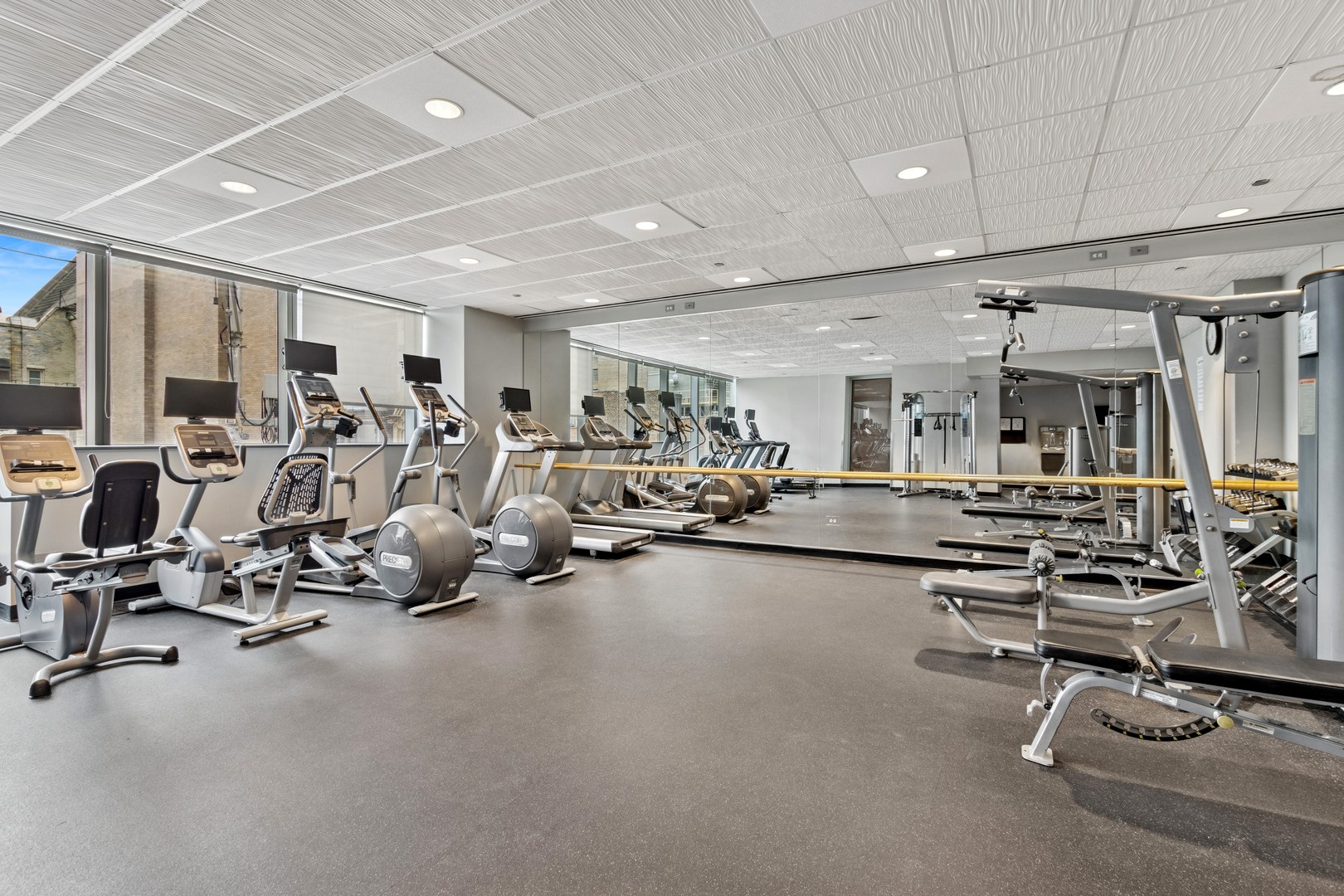 60 East Monroe Street, Unit 3402 Chicago, IL 60603 - Photo 30 of 31 a view of a room with gym equipment