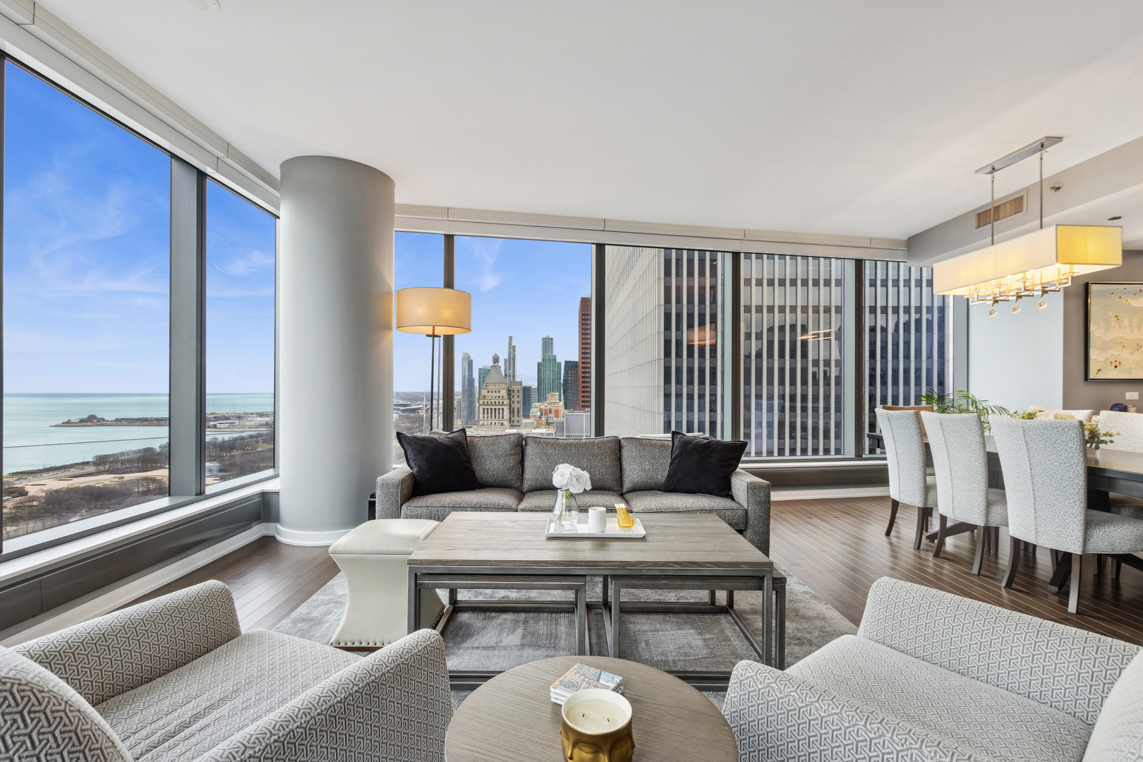 60 East Monroe Street, Unit 3402 Chicago, IL 60603 - Photo 3 of 31 a living room with furniture and a large window