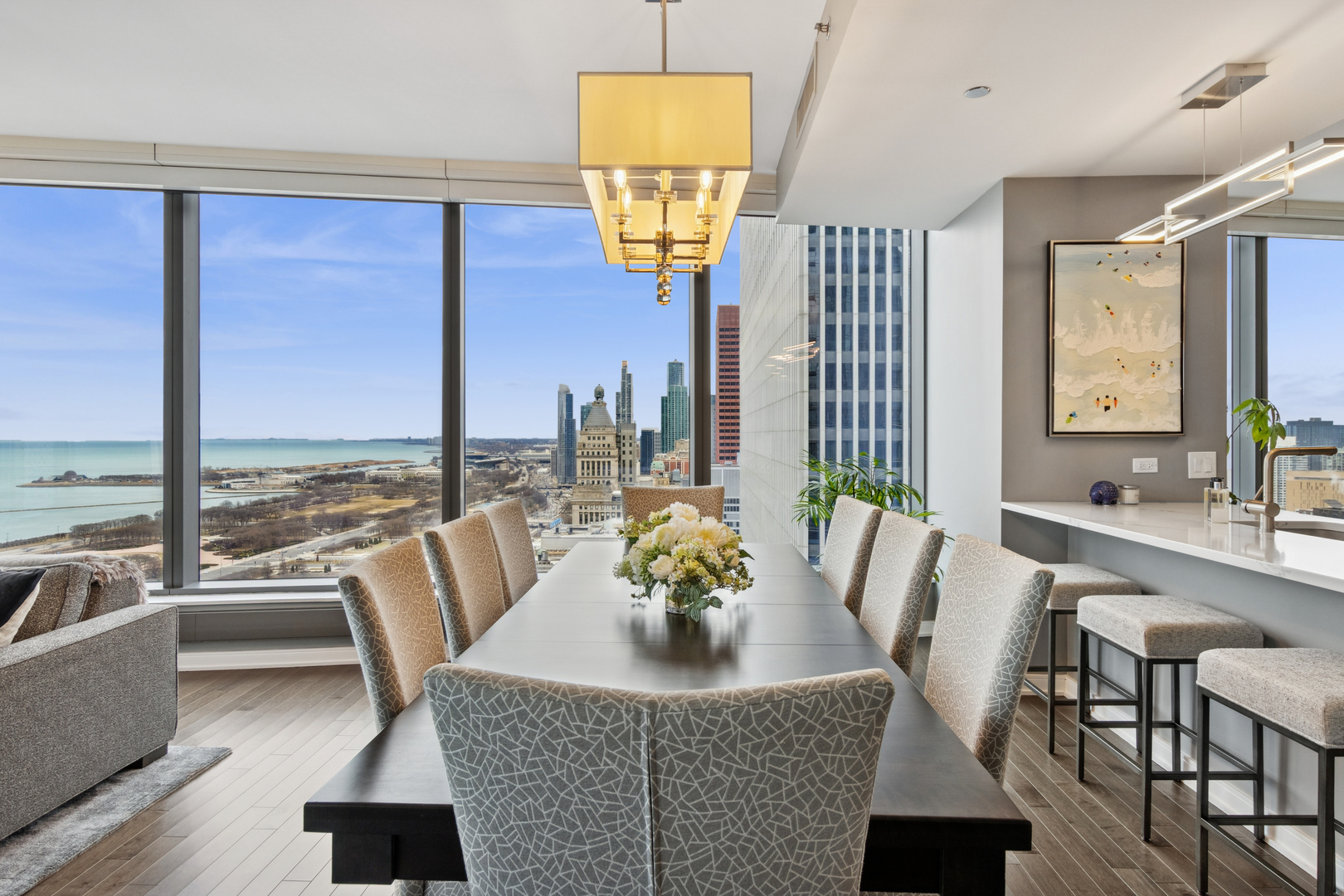 60 East Monroe Street, Unit 3402 Chicago, IL 60603 - Photo 5 of 31 a living room with furniture and a floor to ceiling window