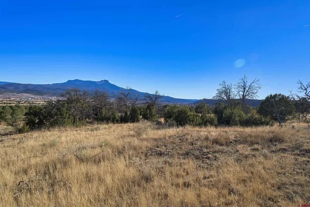 a view of mountain with sunset view