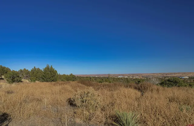 a view of mountain with lake view