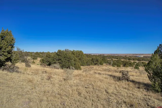 a view of mountain view with mountains in the background
