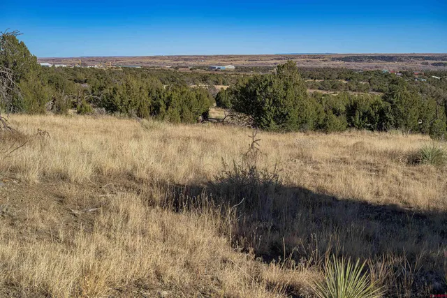 a view of mountain view with mountains in the background
