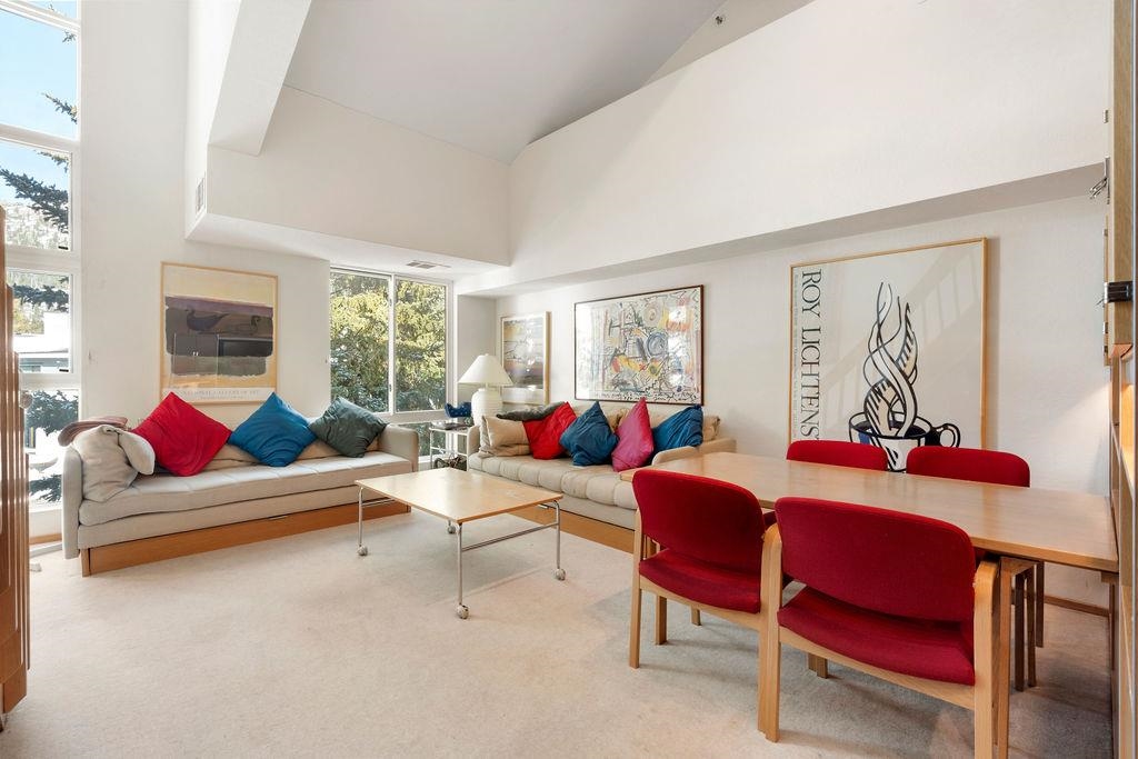 201 Shirley Cyn Road, Unit 309 Olympic Valley, CA 96146 - Photo 4 of 28 a living room with furniture and a large window