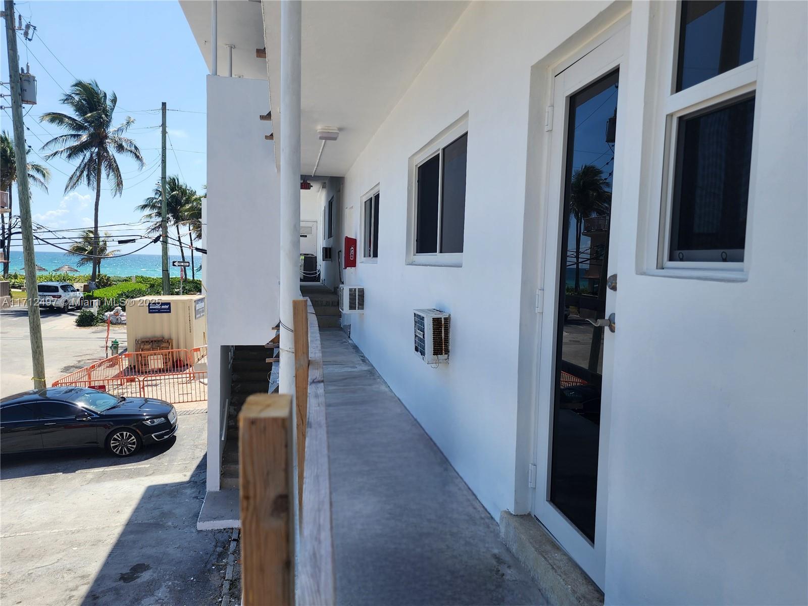 1504 South Surf Road, Unit 57 Hollywood, FL 33019 - Photo 19 of 27 a view of living room with furniture and a potted plant