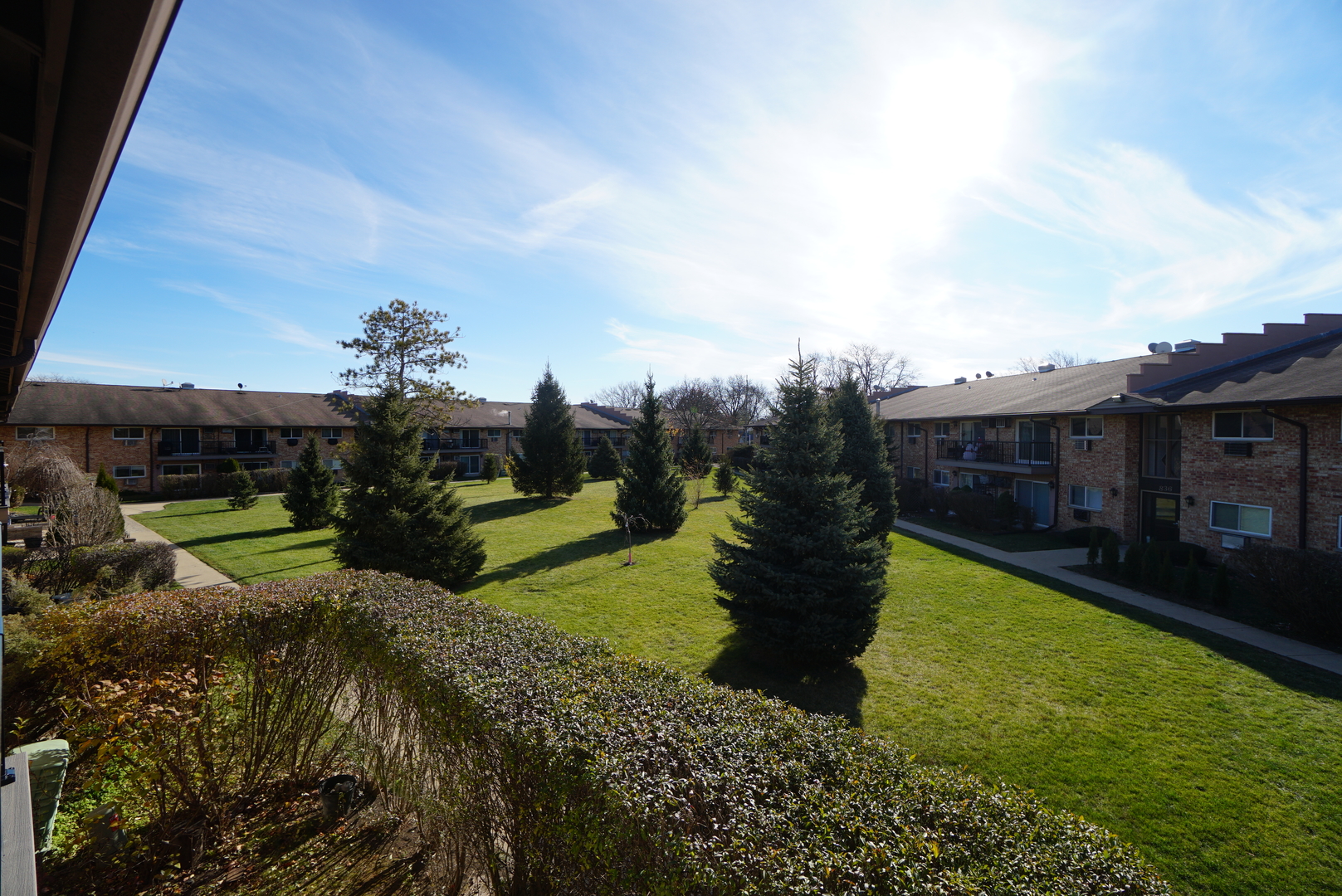 834 East Old Willow Road, Unit 209 Prospect Heights, IL 60070 - Photo 18 of 20 a view of a house with a yard