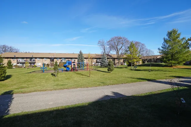 a view of swimming pool with outdoor space and seating area