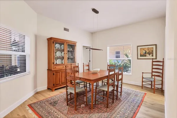 a large kitchen with kitchen island a sink stainless steel appliances and cabinets