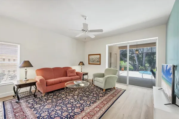 a bathroom with a sink a bathtub and a window