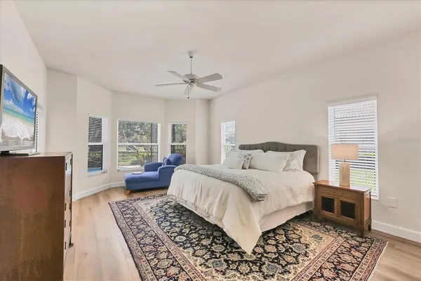 a bathroom with a shower and a sink