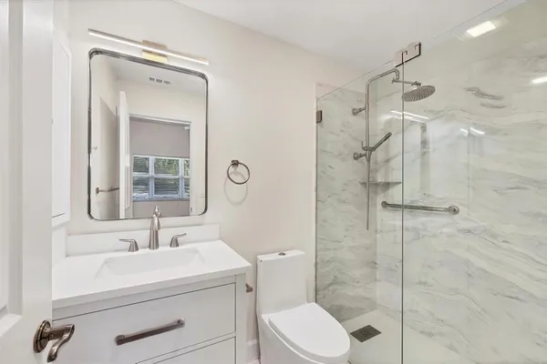 a view of an empty room with a window