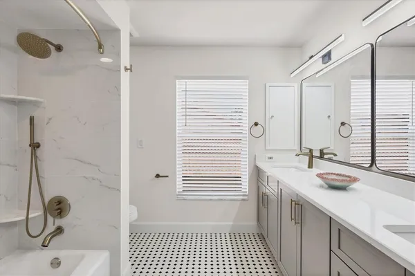 a dining room with furniture and garden view